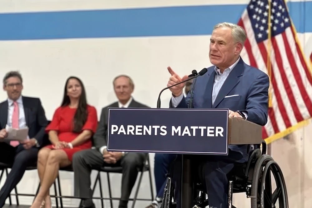 Gov. Greg Abbott speaks at a San Antonio event touting school vouchers.