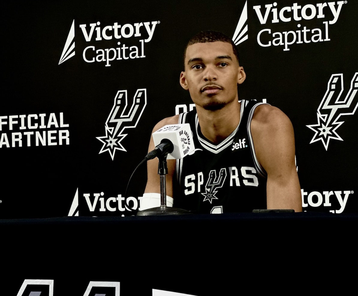 Victor Wembanyama speaks to reporters at a team Media Day event.
