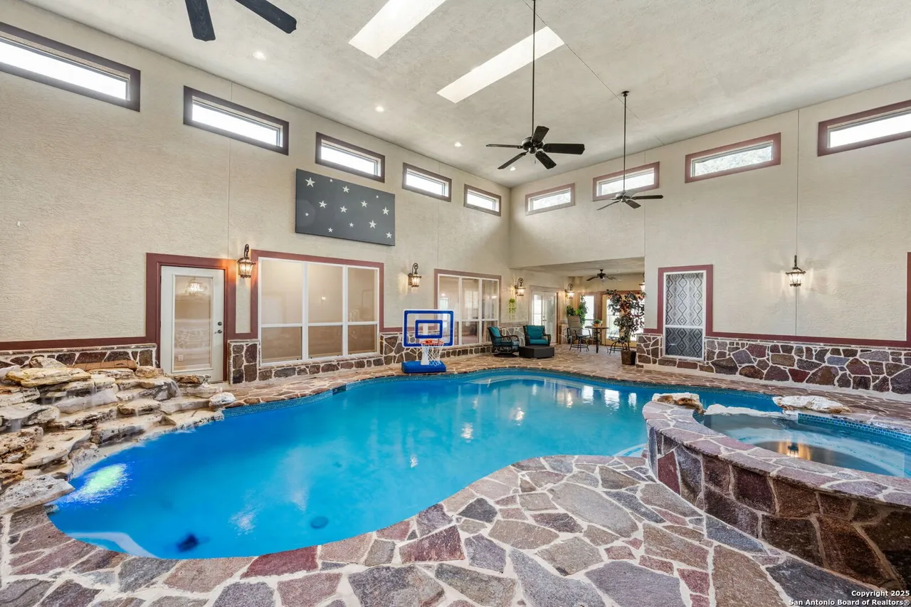 The sale price of this San Antonio mansion with a rare indoor pool just dropped $50,000